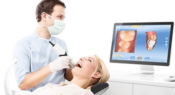 Dentist using CEREC smile design software