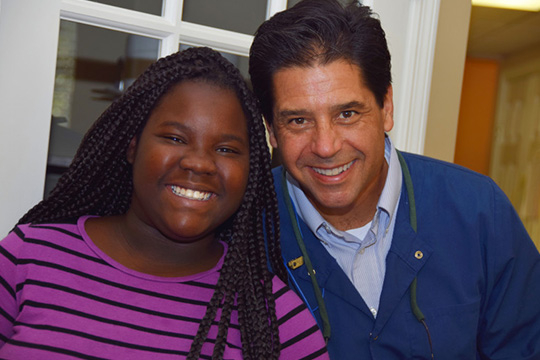 Dr. Lloyd and smiling patient