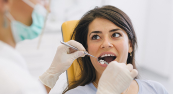 Woman receiving dental crown