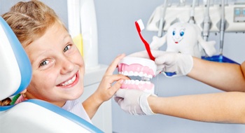 young girl at dentist