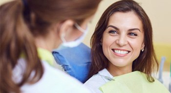 a patient smiling after undergoing nitrous oxide sedation