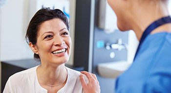 Smiling woman in dental chair