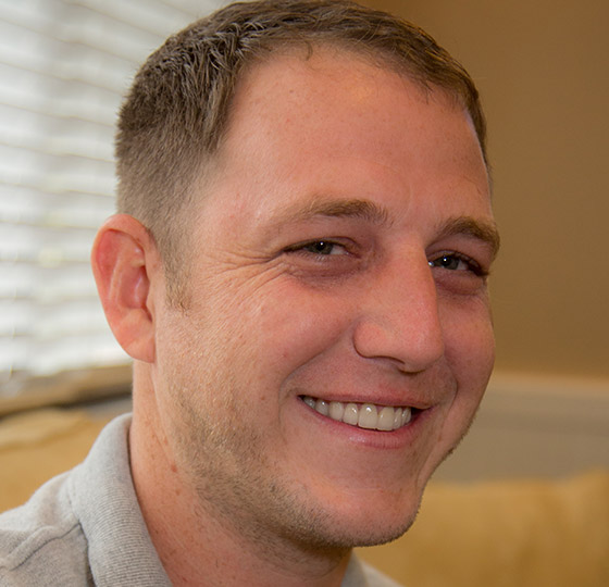 Smiling male dental patient in Daytona Beach