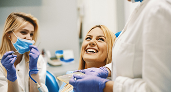 patient talking to dentist 