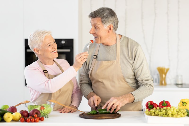 woman feeding her partner